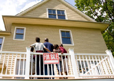Family looking at a home for sale