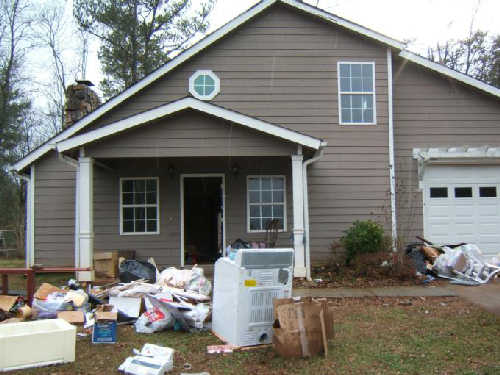 Trash littering a foreclosed home