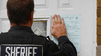 Sheriff Posting an Eviction Notice