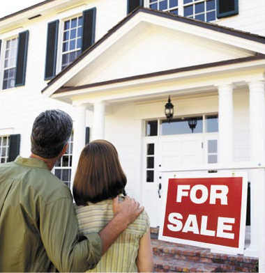 Couple looking at a home for sale