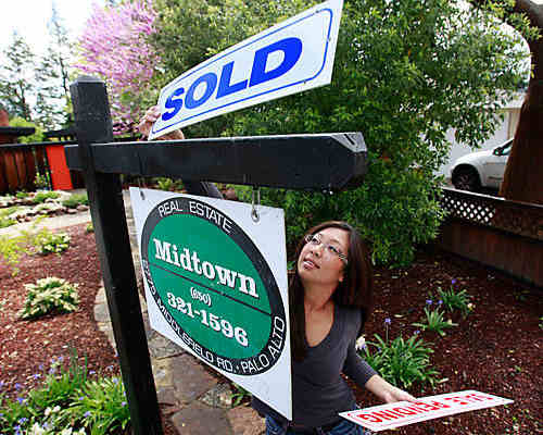 Sold Sign Going Up