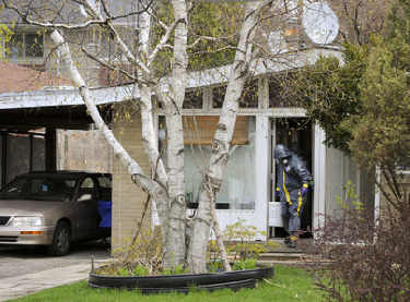 Haz Mat Worker in a Meth Lab Bust in Suburban Neighborhood House