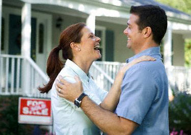 Home Sold - Happy Couple