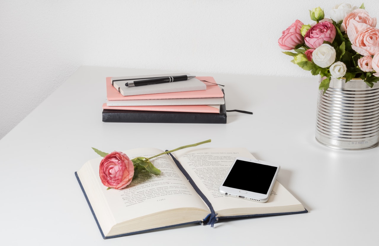 Book on a white wooden table