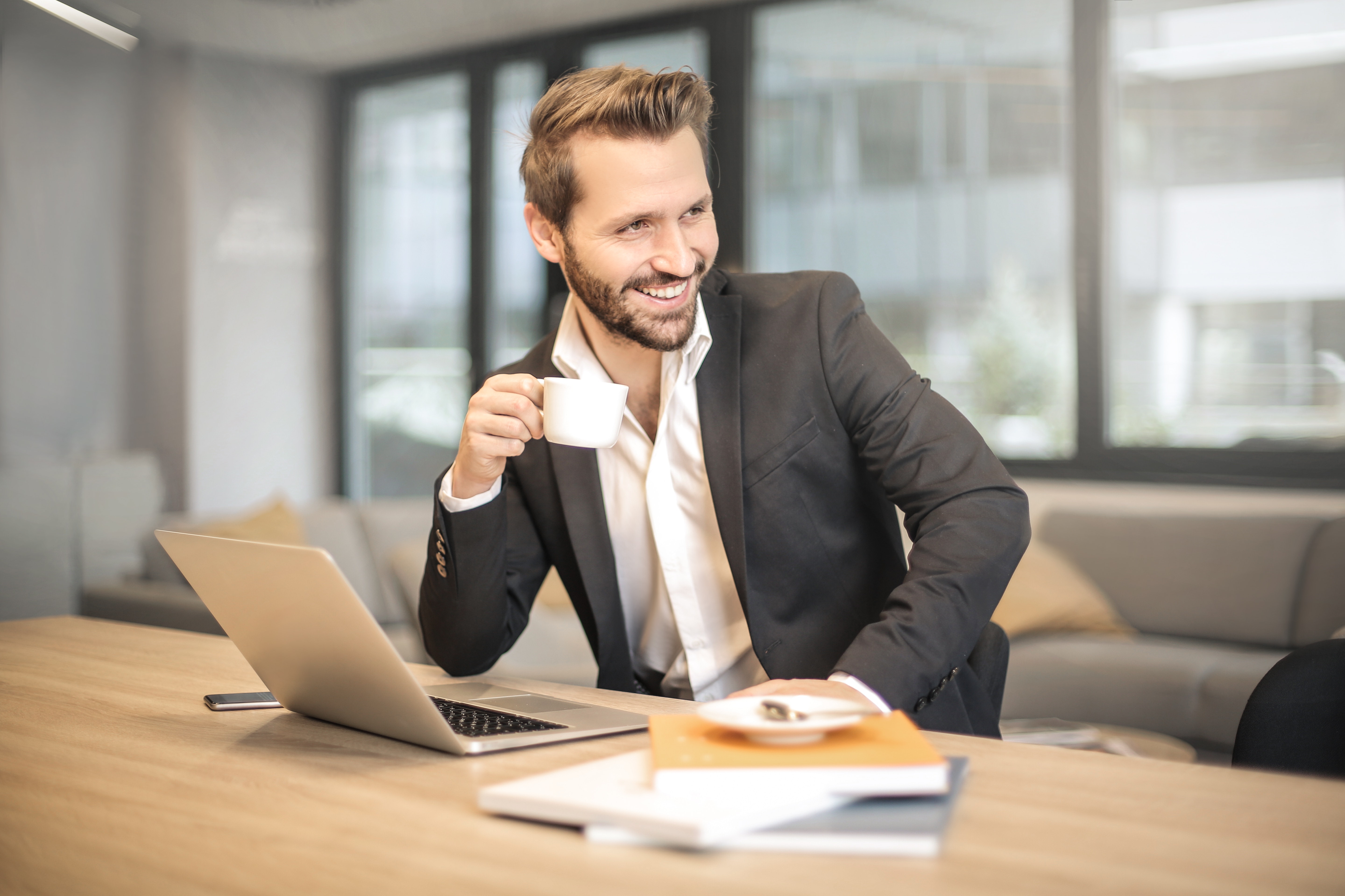 Man holding a cup of coffee