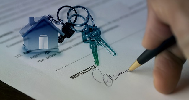 person writing signature