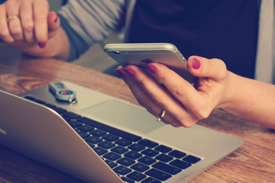 woman holding smartphone