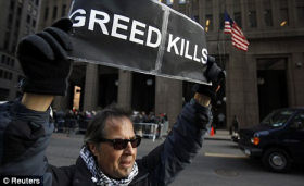 A Protester Outside the Goldman Sachs Building in New York